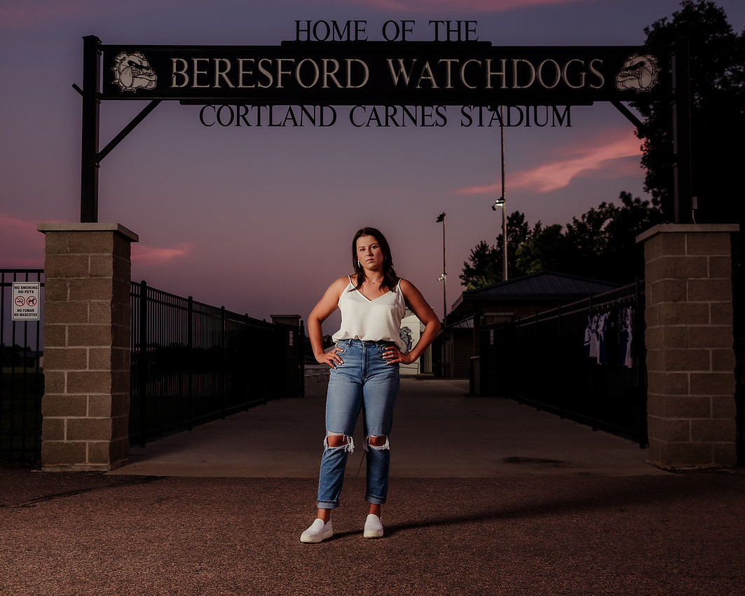 senior girl in front of track complex in Bersford South Dakota taken by Sioux Falls Photographer